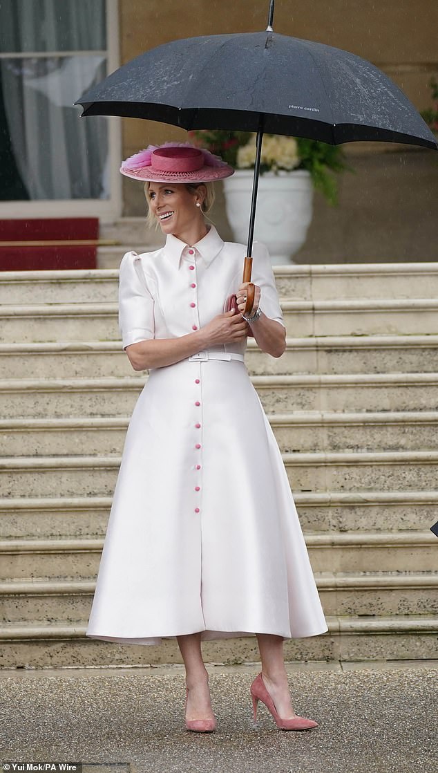 Zara channeled My Fair Lady in a stunning white dress at the Buckingham Palace garden party on Tuesday.