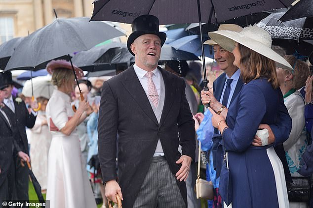 Mike Tindall, pictured, opted for a top hat to accompany his wife to spend the day at Buckingham Palace.