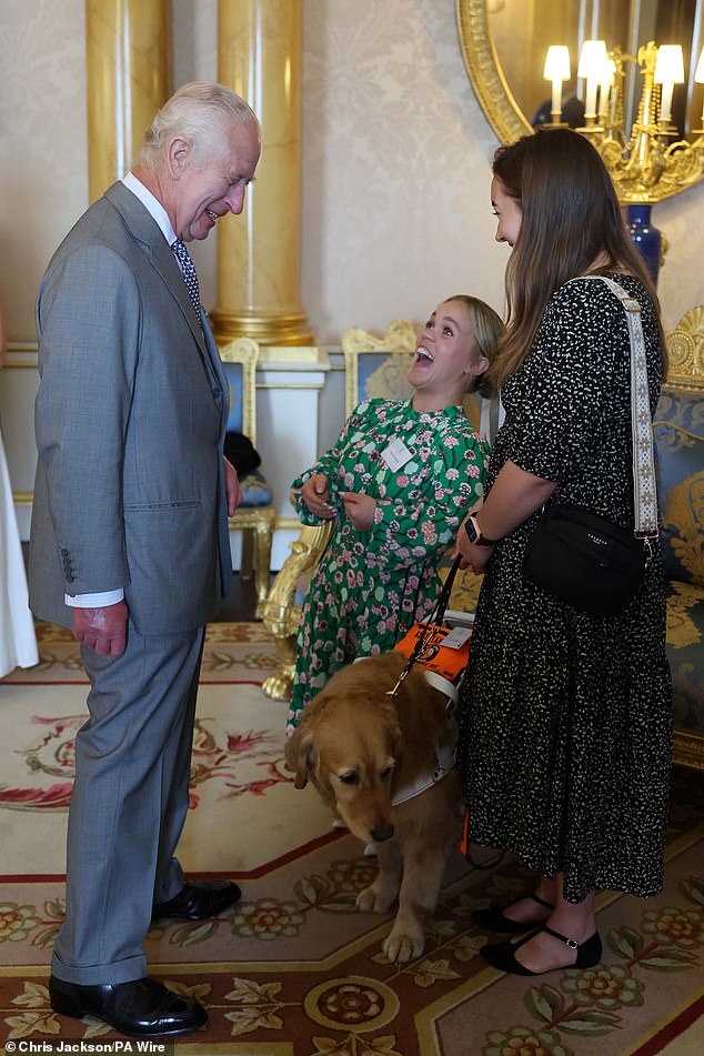 Charles is seen chatting to Ellie Simmons and NatWest business award winner Laura.