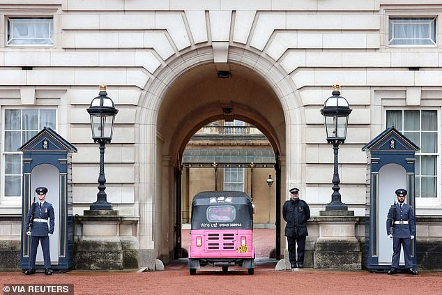 Arti's, the pink rickshaw winner of the Amal Clooney Women's Empowerment Award, parks during the reception