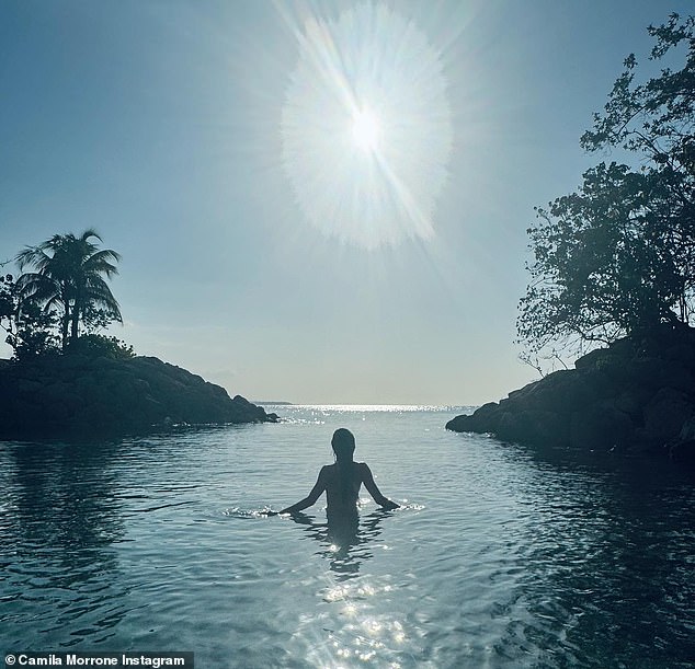 1716404213 729 Camila Morrone poses in a black string bikini while vacationing