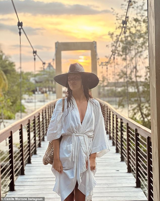 And there was also a photo of her in a white bathrobe while walking on a bridge.