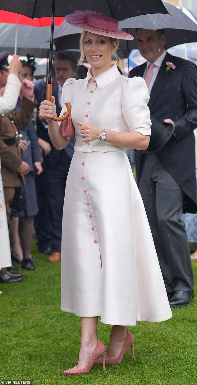 Showing a united front, Princesses Beatrice and Eugenie and Zara Tindall (pictured) opted for matching white and pink outfits as they attended the glamorous occasion in London.