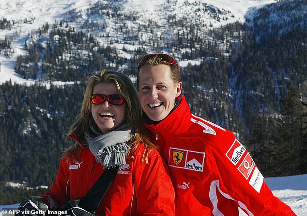 Schumacher's wife Corinna (pictured together skiing in 2005) has kept his condition private.