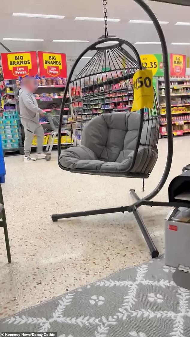 The store's furniture display, which was set up in the supermarket, seemed to Danny and Joey to be the perfect place to relax after their grueling gym session.