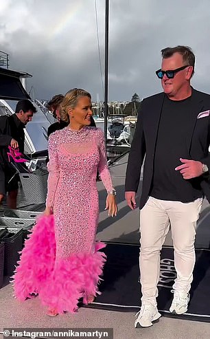 The couple are pictured boarding the superyacht in Sydney Harbor ahead of a wild weekend.