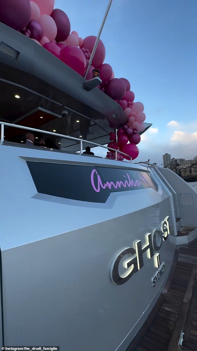 The luxurious yacht, valued at about $16 million, was adorned with pink balloons and a sign that read: 