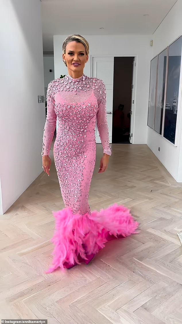 Ensuring all eyes were on her, birthday girl Annika wore a long-sleeved neon pink Sonia Stradiotto Couture dress that featured gemstone-encrusted mesh and a fishtail skirt covered in feathers.