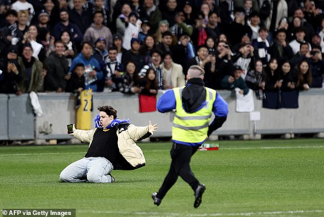 Tagging himself on TikTok as 'Melbournesmennace', the man boldly decided to film himself trespassing into the arena (pictured) on Tuesday night.