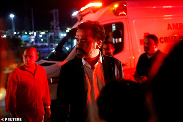 The president of the Citizen Movement party, Jorge Álvarez Maynez, reacts at the scene after a gust of wind caused the collapse of a structure, causing multiple deaths and injuries, at a campaign event of the Citizen Movement party, in San Pedro Garza García .