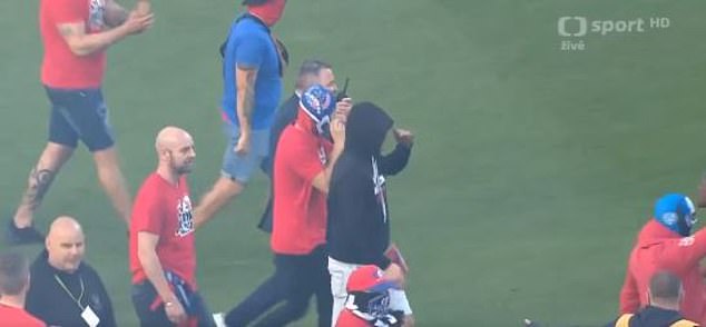 Messy fans on both sides sported hoods and balaclavas in an attempt to hide their faces.