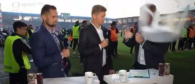 Presenters covering the match for Czech Television were attacked with a flying plastic chair