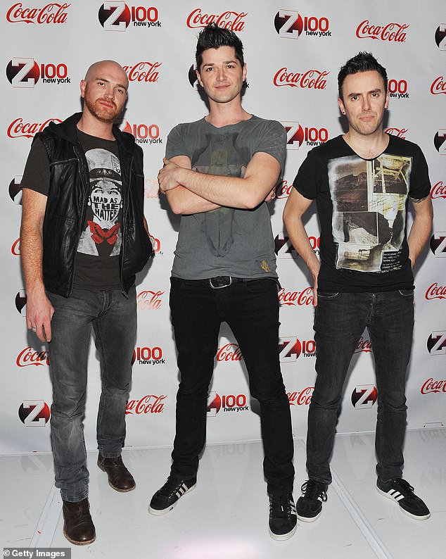 Mark formed the band with Danny and drummer Glen Power in 2001 (pictured at Jingle Ball 2011)