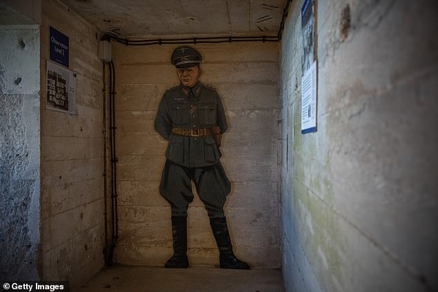 A model of a German officer is displayed inside the Odeon, a 15 meter high concrete naval tower built by forced laborers in Alderney.