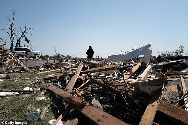 Of the 35 people reported as injured by the tornado, at least 14 were taken to hospitals outside the county for medical treatment, officials said, adding that the actual number of injured people is likely higher.