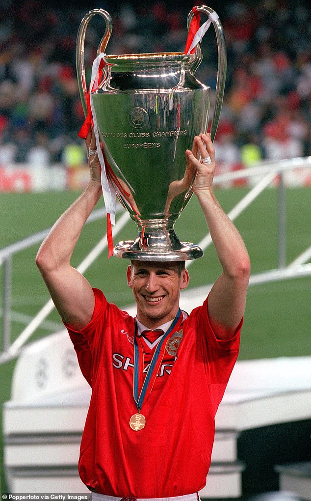 Stam, seen after winning the 1999 Champions League final, was part of United's historic treble.