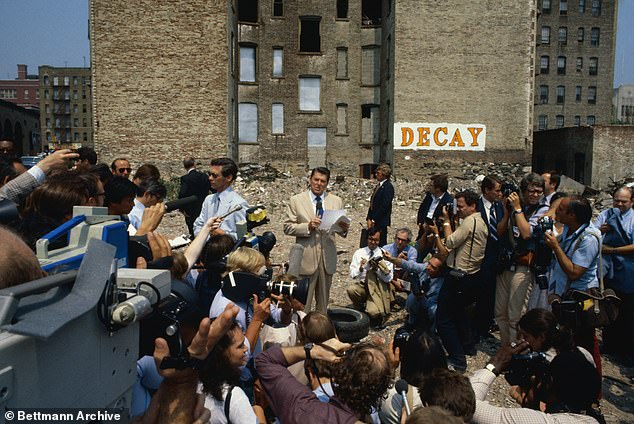 Ronald Reagan during his visit to the South Bronx in 1980 giving remarks in front of a sign that read 