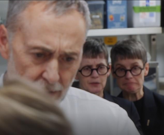 Tense: Austrian waiters watched as Louise struggled to perfect her dish.