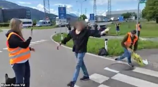 Seven climate activists blocked a roundabout leading to the A14 motorway, and the chaotic protest was one of five taking place at border crossings in the region at the same time.