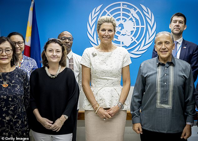 Máxima, in the middle photo, wore a textured white dress cinched at the waist along with a long beige skirt.