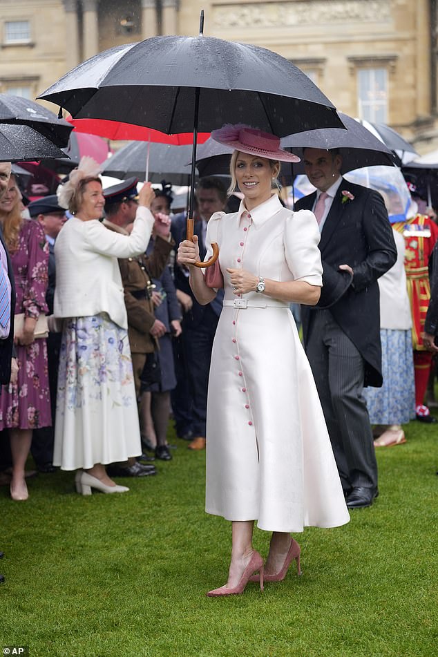 The equestrian and Olympian completed her outfit with an elegant Rosa Boater hat, also in pink