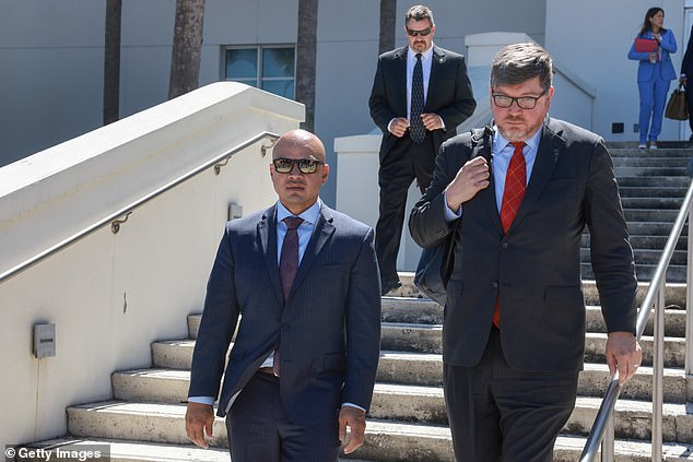 Trump aide Walt Nauta (left) leaves court with defense attorney Stanley Woodward (right). Woodward says there has been prosecutorial misconduct in the case, alleging that special counsel Jack Smith's team suggested that Woodward would not be appointed to the court unless his client, Nauta, cooperated.