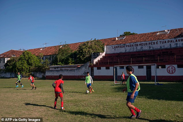 Children play soccer on Paqueta Island in Brazil, where unusual amounts of betting activity date back.