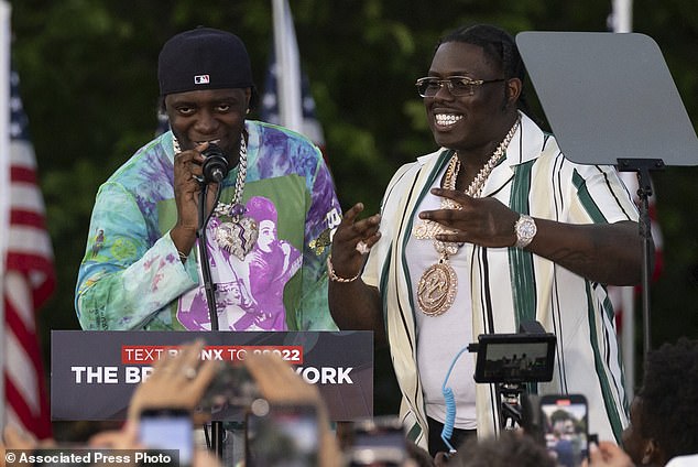 Rappers Sheff G (right), aka Michael Williams, and Sleepy Hallow, aka Tegan Chambers, join Republican presidential candidate former President Donald Trump during a campaign rally in the South Bronx.