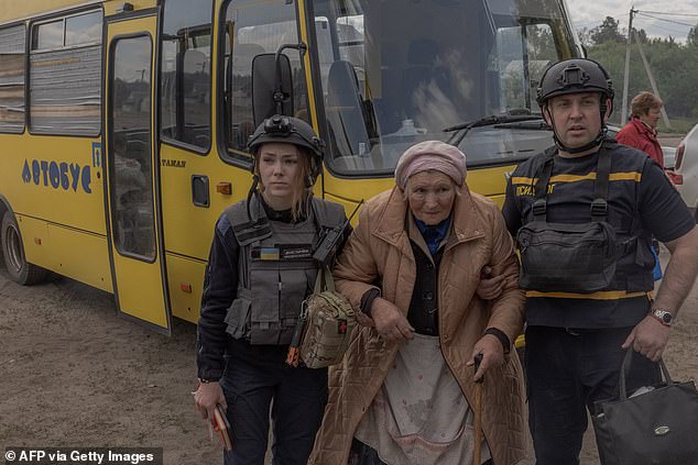 A Ukrainian evacuee arrives at an evacuation point in the Kharkiv region on May 12, 2024.