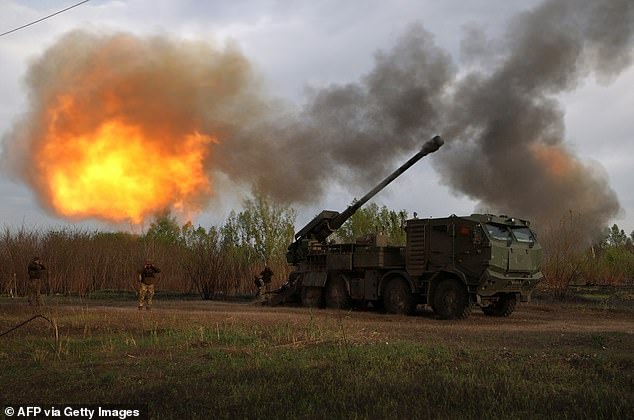 Ukrainian forces fire on a Russian position with a 155mm howitzer in the Kharkiv region on April 21.