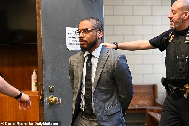 Tyrese Haspil smiles as he enters Manhattan Supreme Court as he goes on trial for murder