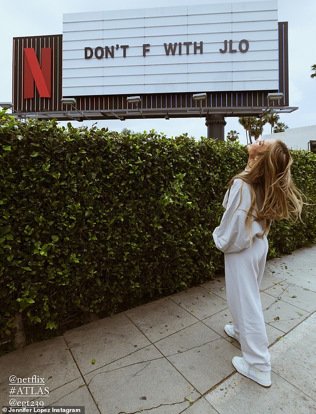 'Oh, there it is!' she exclaimed excitedly as her car pulled up to the right spot, allowing her to take some memorable photos there.