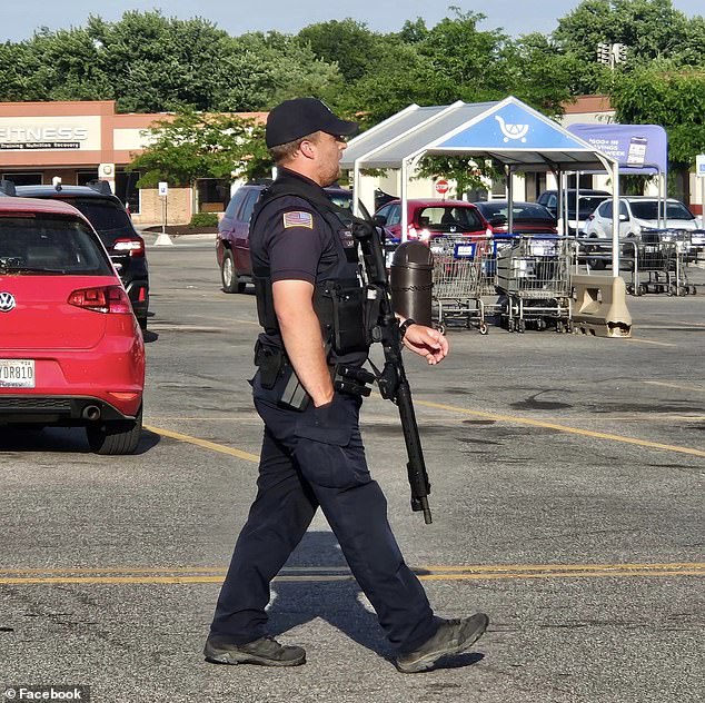 Police stood guard outside the store Friday after it was closed.