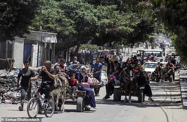 Palestinians fleeing Jabalia in the northern region, photographed arriving in Gaza City on May 24, 2024.