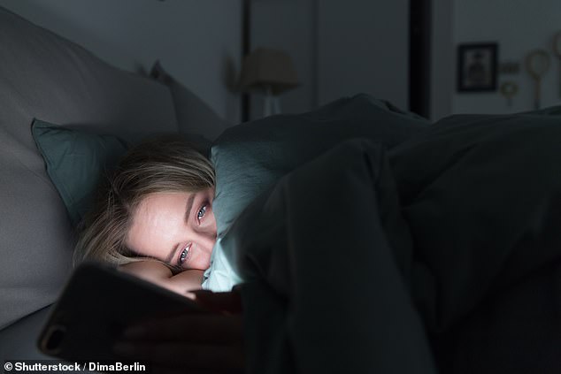 Avoid using electronic devices such as smartphones, computers or tablets before bed (stock image)