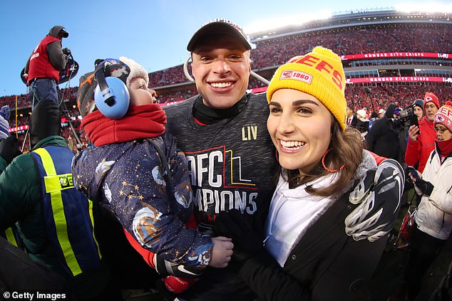 Butker celebrates on the field with his wife Isabelle and son after defeating the Tennessee Titans in the AFC Championship Game at Arrowhead Stadium on January 19, 2020.