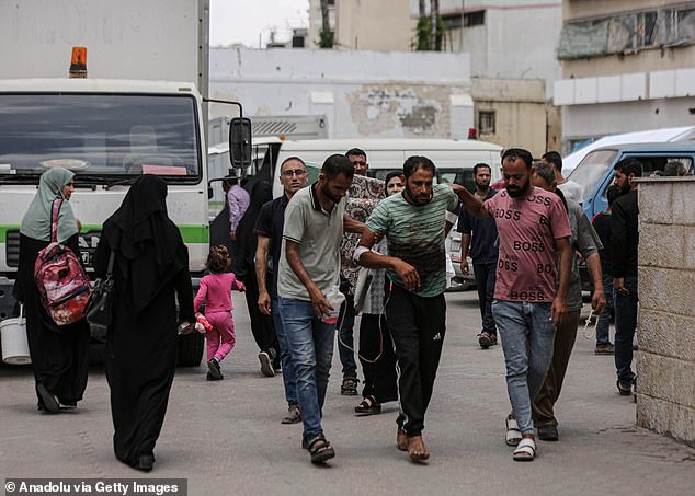 Injured people are brought to Al-Ahli Baptist Hospital in Gaza City, Gaza, after the Israeli army attacked the Al-Nazla school building on May 25, 2024.