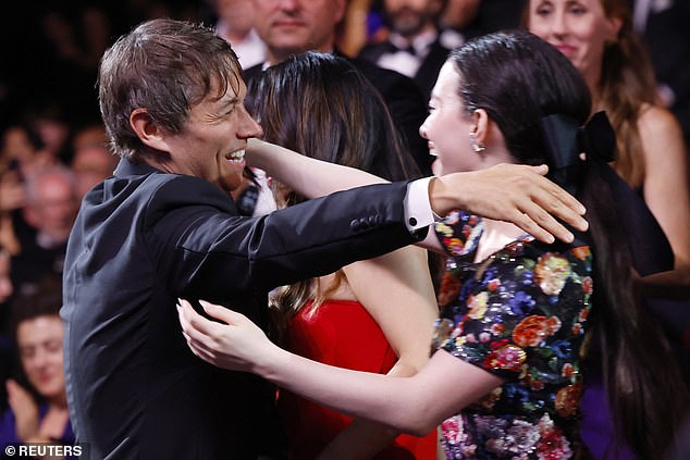 Sean and Mikey, 25, hugged after accepting the award.