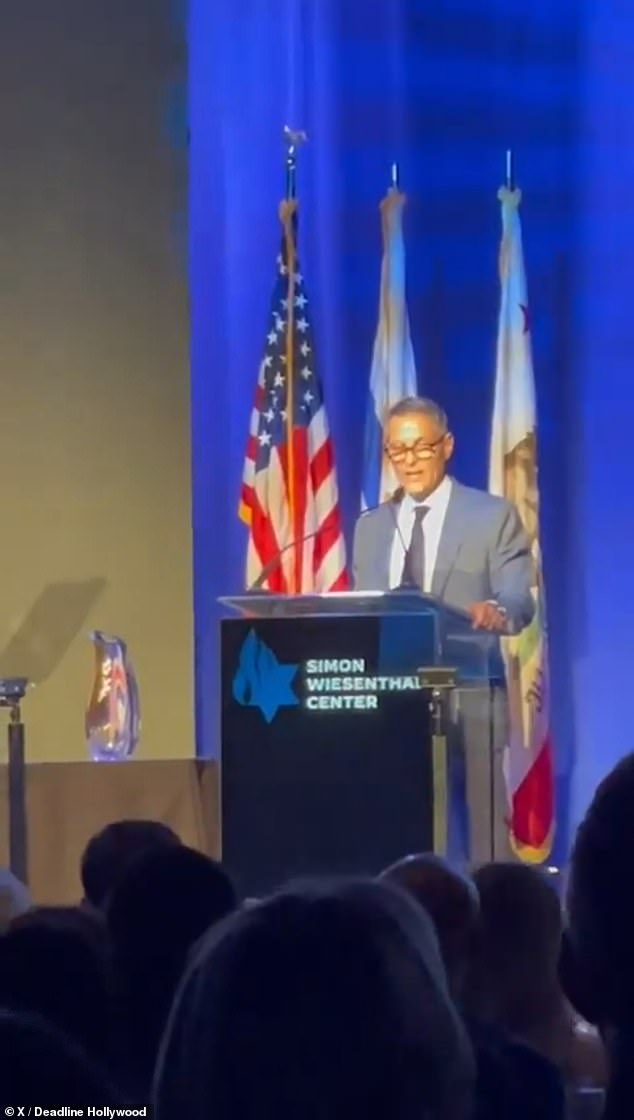 In the photo: Emanuel giving his speech at the Simon Wiesenthal Center gala in Beverly Hills, where he was presented with the Jewish organization's Humanitarian Award, its highest honor.