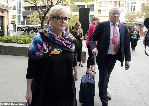 Linda Reynolds is pictured outside court on Tuesday, with her lawyer Martin Bennett.