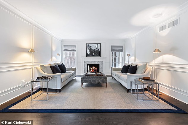 The family room features high ceilings and French doors that lead to a cozy backyard.