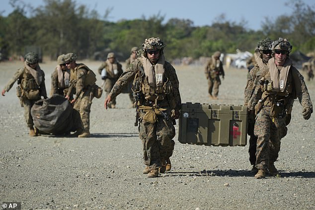 U.S. Marines transport equipment during a joint military exercise in the Philippines May 6, 2024.