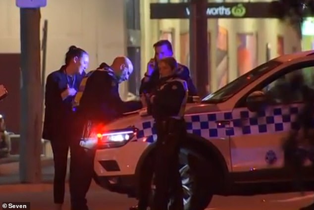 Those involved are not assisting police investigations despite a machete reportedly being used in the fight (pictured, police at the scene)