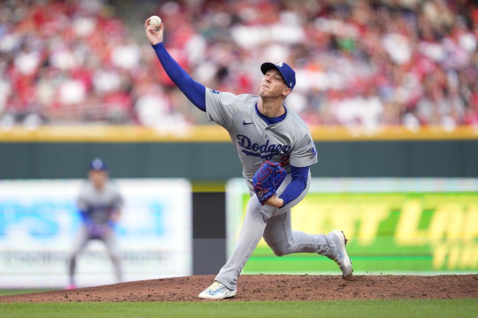 Dodgers starting pitcher Walker Buehler delivers against the Cincinnati Reds.