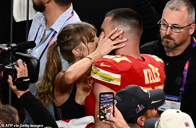 Her NFL star boyfriend Travis Kelce, 34, is said to be joining her in the rural countryside for a getaway (pictured kissing at the Super Bowl after Kansas City's win).