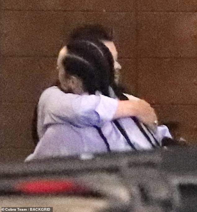 The two friends shared a warm hug as they said goodbye for the night and headed home.