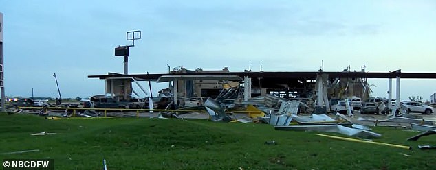 The Shell gas station was part of the AP Travel Center, where dozens of people went Saturday night to hide from the tornado. In total, five people were reported dead in Cooke County.