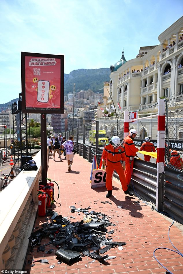 Marshals were forced to clear a significant amount of debris before racing could resume.