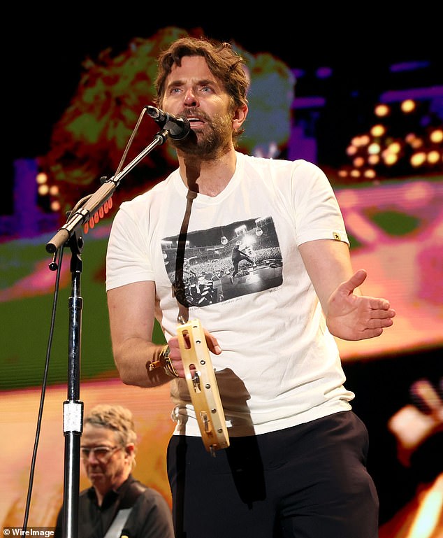 At the end of Pearl Jam's set, Cooper was seen joining the band again, after donning a graphic t-shirt and showing off his beat with a tambourine.