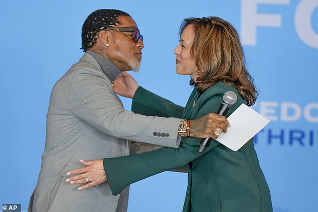 Vice President Kamala Harris hugs comedian and author DL ​​Hughley